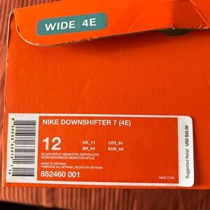 Men’s 12 4E Nike. Only worn twice. Small stain shown on top (as shown)